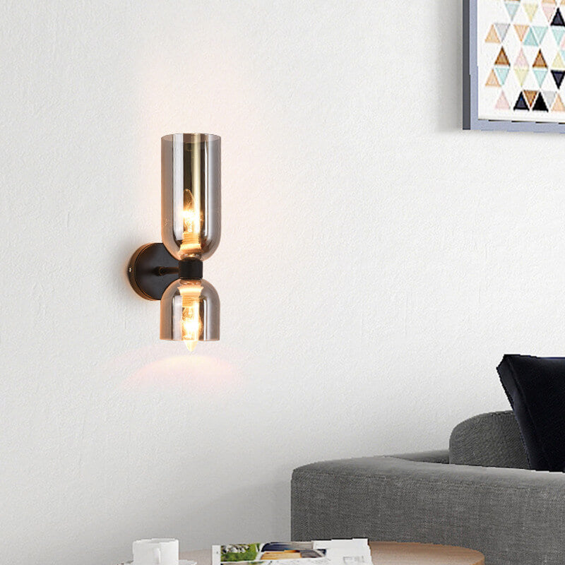 Cylindrical glass wall sconce — dual clear glass shades on iron frame | Casa Norex