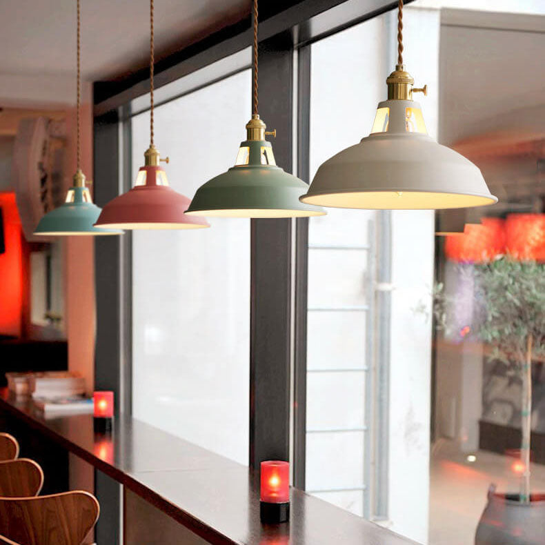 Row of four barn shade pendant lights above a restaurant counter — Casa Norex