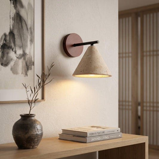 Japandi sconce in bedroom - porous stone shade warm glow - Casa Norex