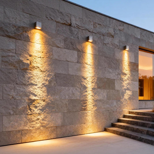 Quill spot light on an exterior stone wall — Casa Norex