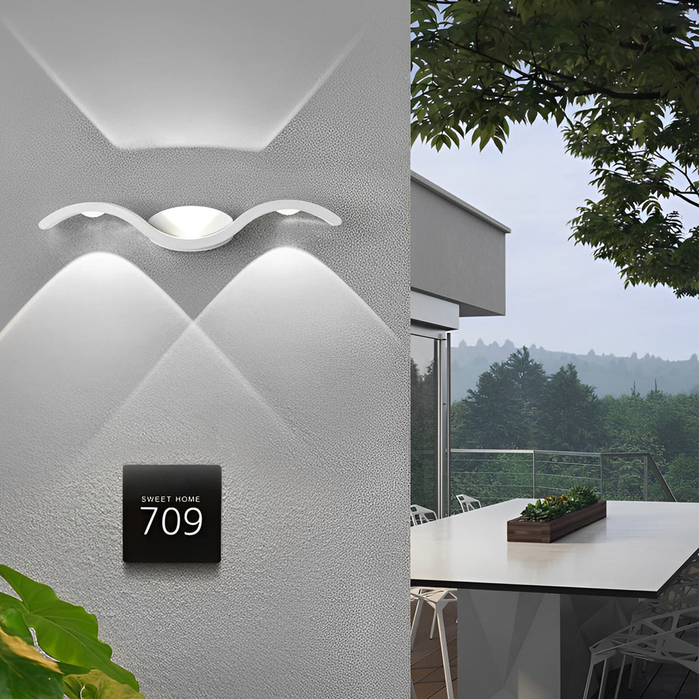 Wave wall sconce in white finish — angle view | Casa Norex