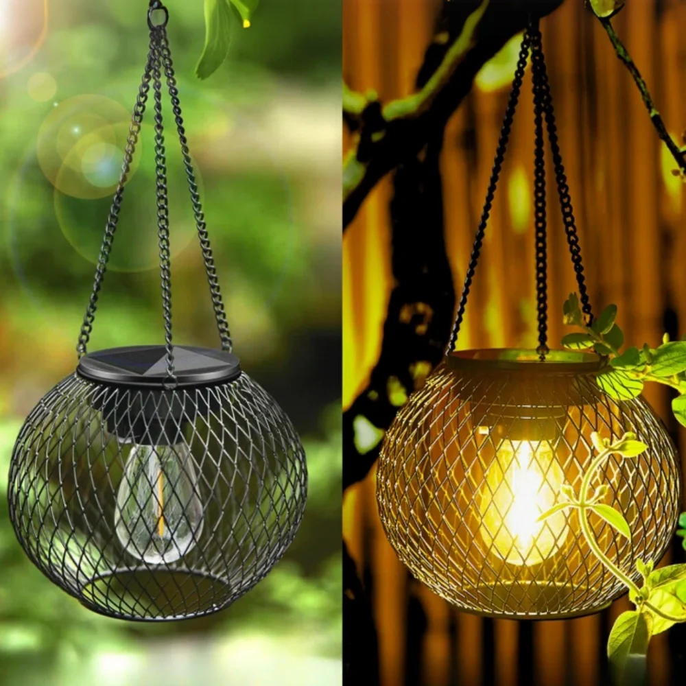 Round mesh lanterns, one lit and one unlit, hanging among greenery — Casa Norex