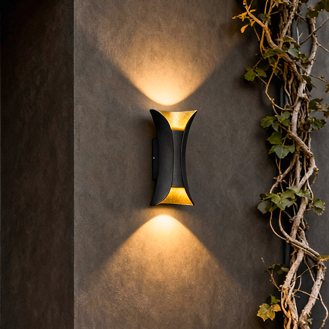 Close-up of black and gold finish on up-down wall light | Casa Norex