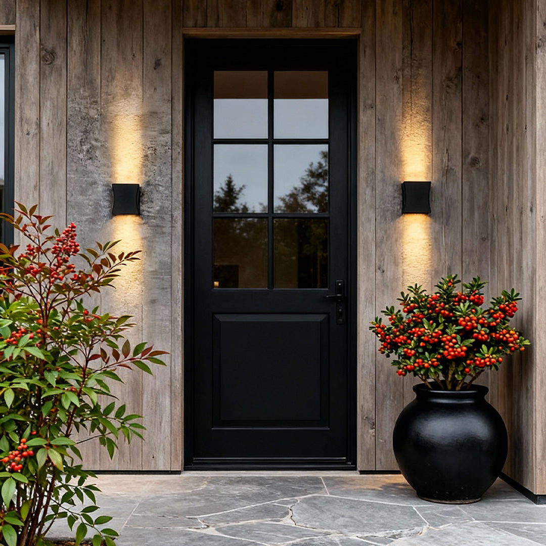 Up down outdoor wall light beside outdoor seating with soft illumination — Casa Norex