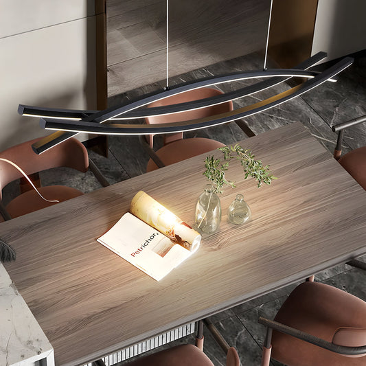 Wave hanging light in dining room setting — linear glow | Casa Norex