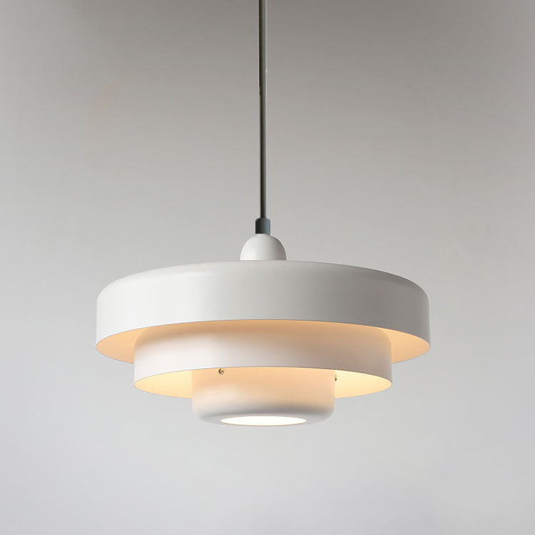 Pendant Light installed angle view — layered metal shade | Casa Norex