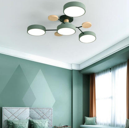 Green 4-light branch ceiling light in a green bedroom — Casa Norex