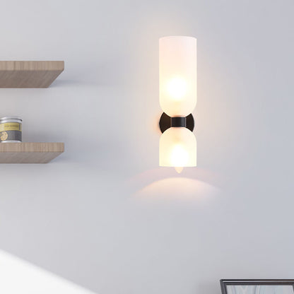 Close-up of cylindrical glass shade and iron frame detail | Casa Norex