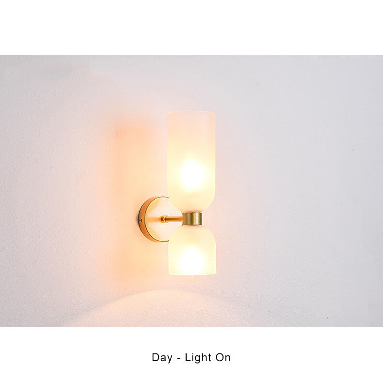Wall sconce in gold finish detail — Casa Norex
