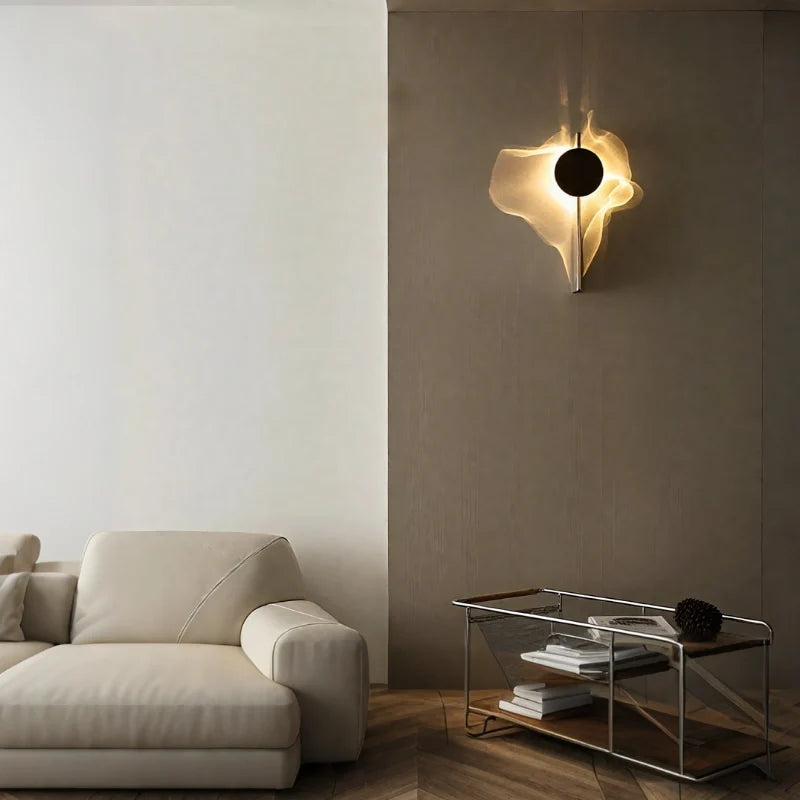 Solo wall sconce on a taupe wall above a white sofa in a bright living room — Casa Norex