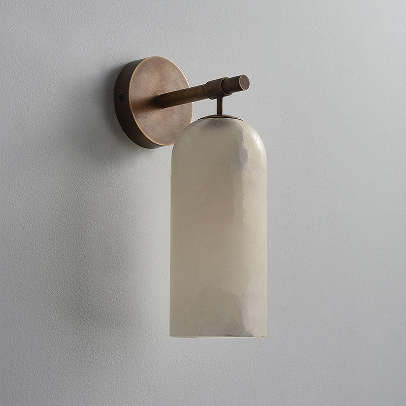 Wall sconce in bedroom setting — warm ambient glow | Casa Norex