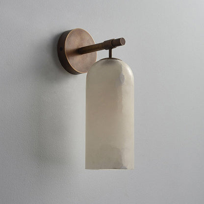 Wall sconce in bedroom setting — warm ambient glow | Casa Norex