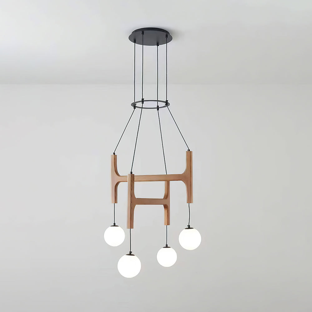 Wood chandelier 4-head configuration over dining table — Casa Norex