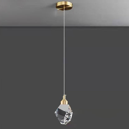 Crystal cube pendant light hung above bedroom nightstand — Casa Norex