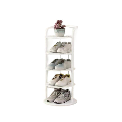 Iron shoe rack in gold finish against entryway wall | Casa Norex