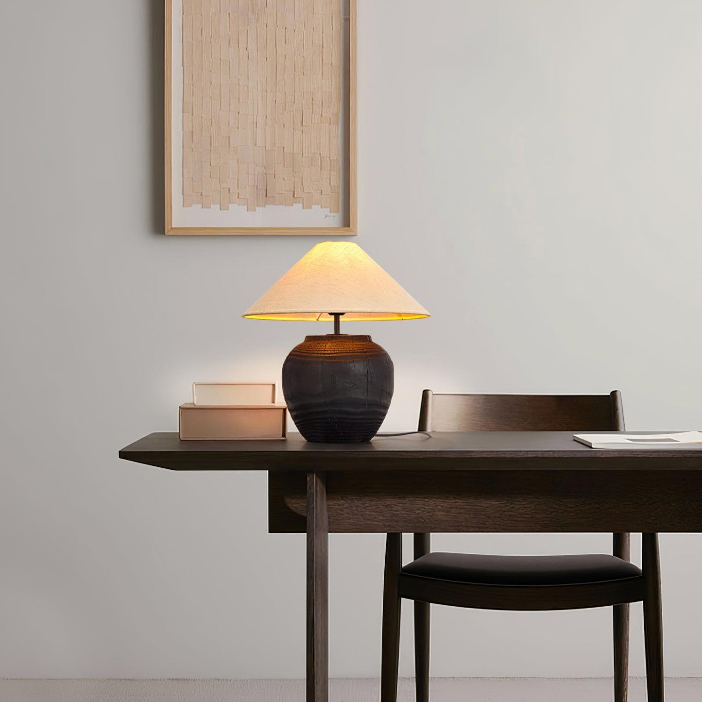 Black Karen lamp on office desk - warm ambient focus - Casa Norex