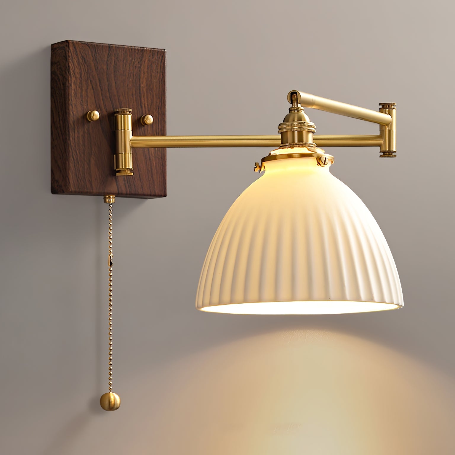 Close-up of pull chain switch on ceramic wall sconce | Casa Norex