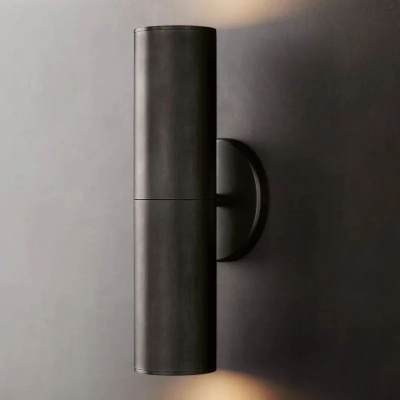 Wall sconce in living room setting — ambient glow | Casa Norex