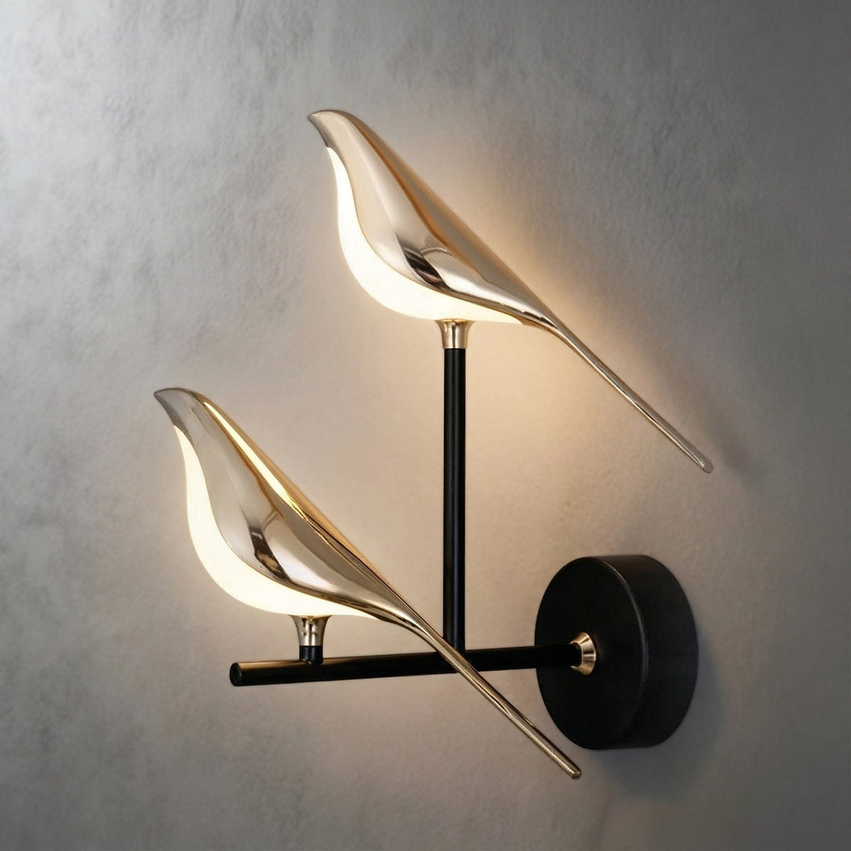 Close-up of wing-shaped detail on wall sconce | Casa Norex