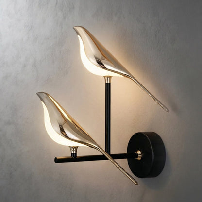 Close-up of wing-shaped detail on wall sconce | Casa Norex