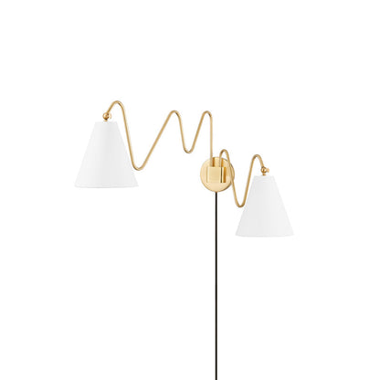 Curved brass arm close-up - Cleome swing plug-in wall lamp by Casa Norex