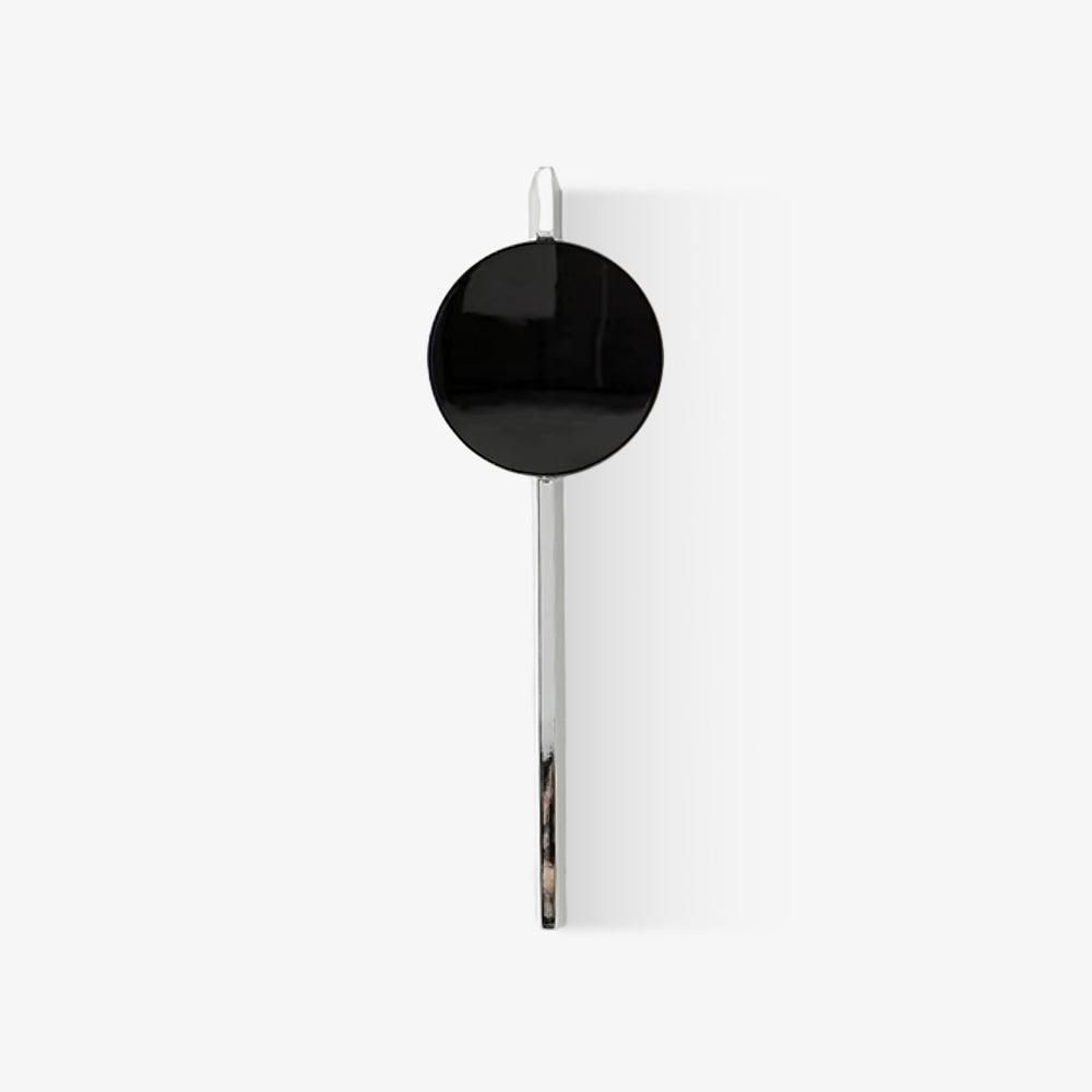 Close-up of mirrored chrome surface on wall sconce | Casa Norex