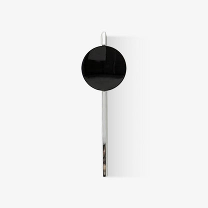 Close-up of mirrored chrome surface on wall sconce | Casa Norex