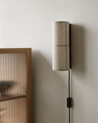 Cylinder Fabric sconce installed reading corner - Casa Norex