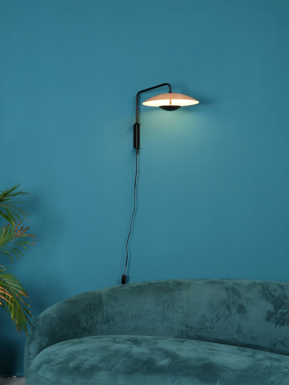 Ginger cymbal-inspired wall sconce installed dining room - Casa Norex