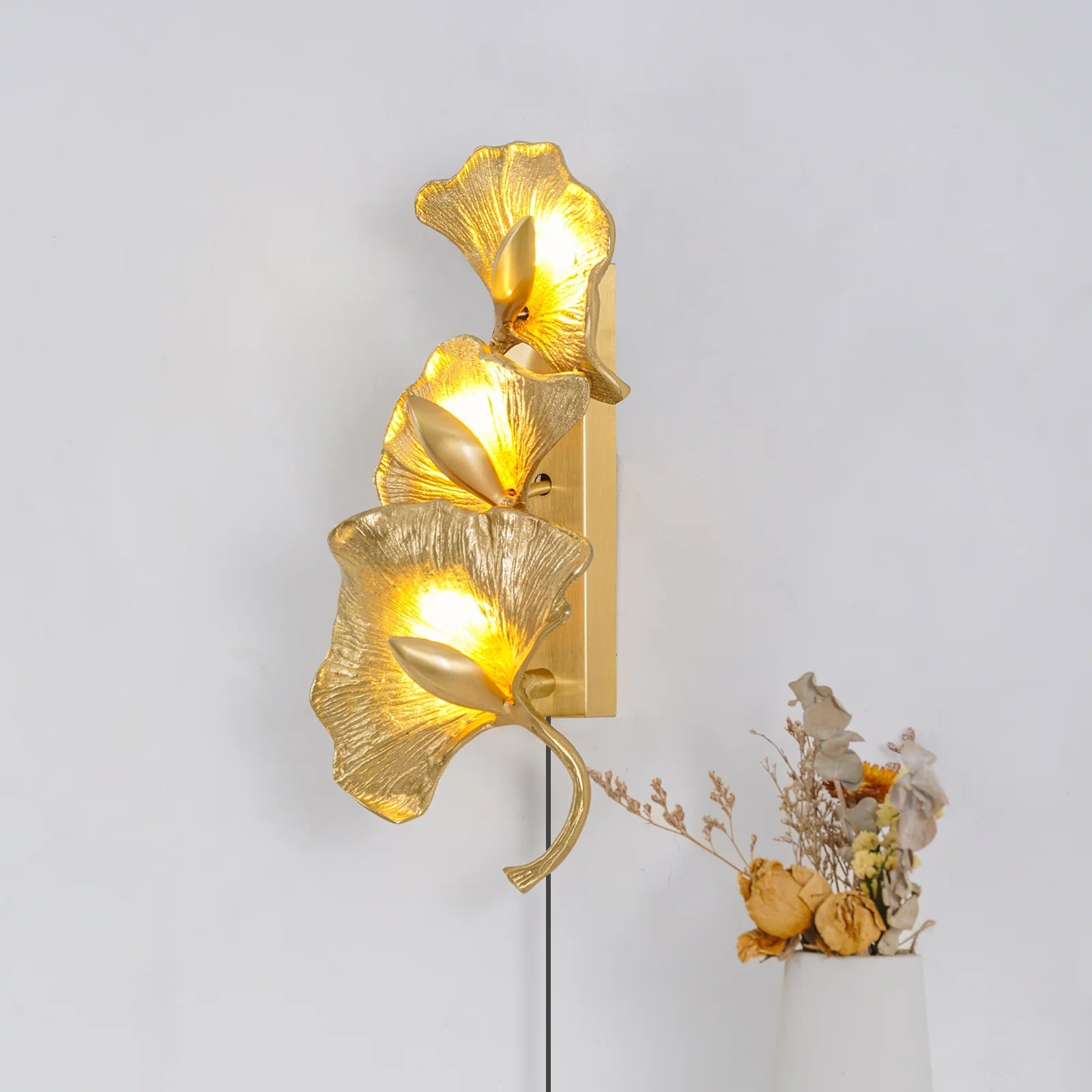Ginkgo Leaf plug-in wall lamp side view - brass finish - Casa Norex