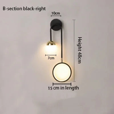 Round ball wall sconce, B-style ball shade, left-facing | Casa Norex