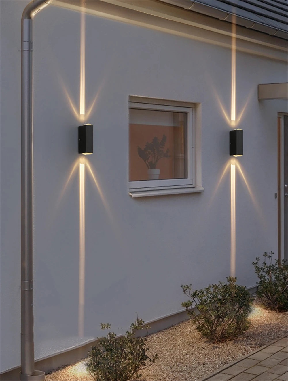 COB LED outdoor wall light illuminating a garden pathway at night — Casa Norex