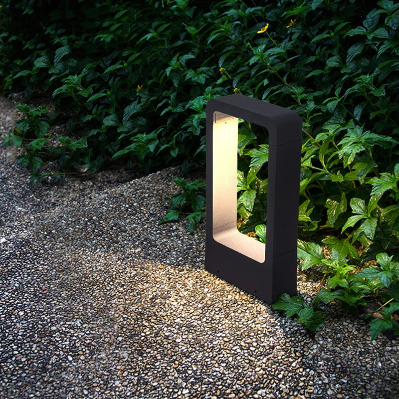 Solari bollard light warm white glow at night — Casa Norex