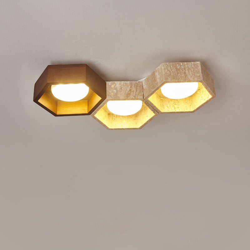 Close-up of travertine panel on honeycomb ceiling lamp | Casa Norex