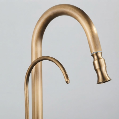 Marchbank Antique Brass 3-Way Filtered Kitchen Faucet — high-arc 360° gooseneck, angled view | Casa Norex