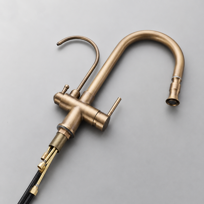 Marchbank Antique Brass 3-Way Filtered Kitchen Faucet — filtered water channel, angled view | Casa Norex
