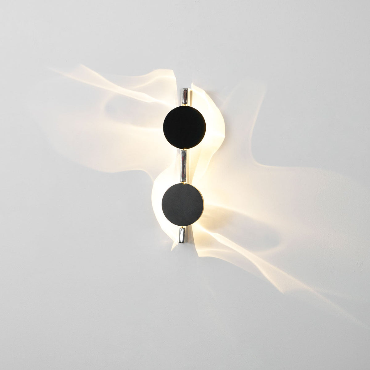 Wall sconce in modern living room setting — shifting light and shadow effect | Casa Norex