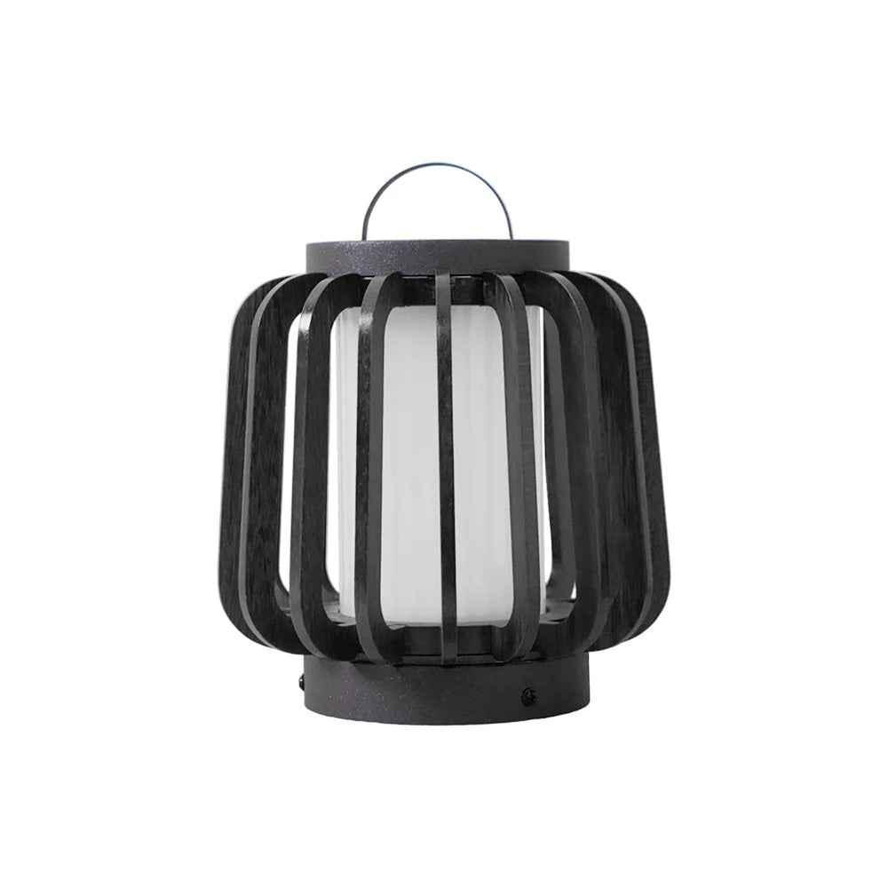 Lanvera outdoor lamp on patio table at dusk - warm glow - Casa Norex