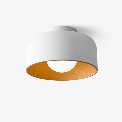 Close-up of wood grain hydrographic finish on ceiling light | Casa Norex