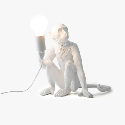 Sculptural monkey table lamp — interior setting | Casa Norex