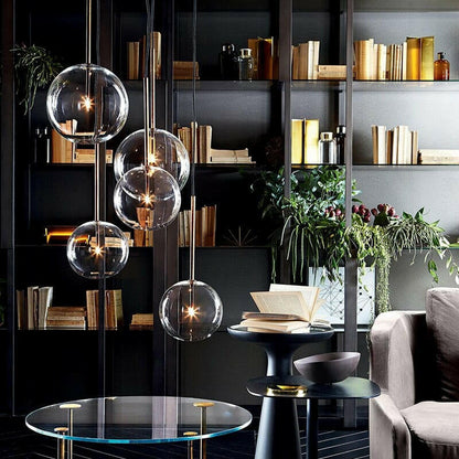 Pendant light in dining room setting — hanging over table | Casa Norex