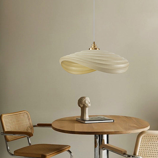 Unique pendant light in dining room setting — rippling ambient glow | Casa Norex