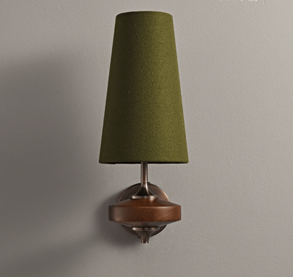 Wall sconce flanking bed in bedroom setting | Casa Norex