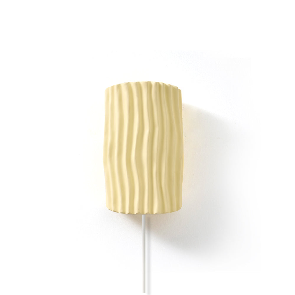 Waverly wall sconce in bedroom setting soft warm glow - Casa Norex