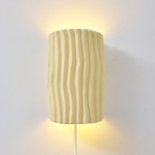 Waverly pleated resin plug-in wall sconce beige wave texture | Casa Norex