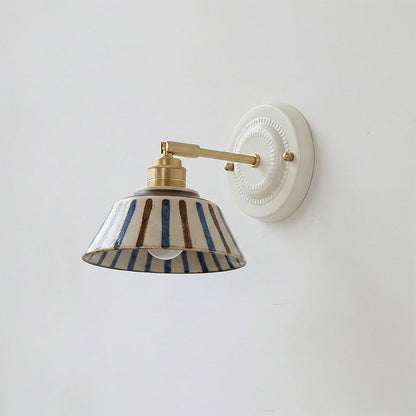Wall sconce in bedroom setting — warm bedside light | Casa Norex