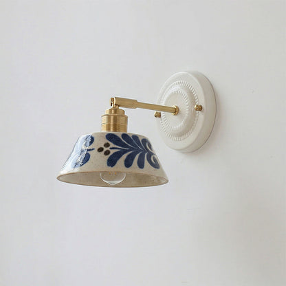 Ceramic wall sconce Model B angle — brass and blue | Casa Norex