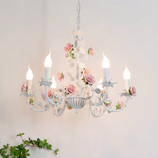 Rose chandelier in bedroom setting - blush pink petals | Casa Norex