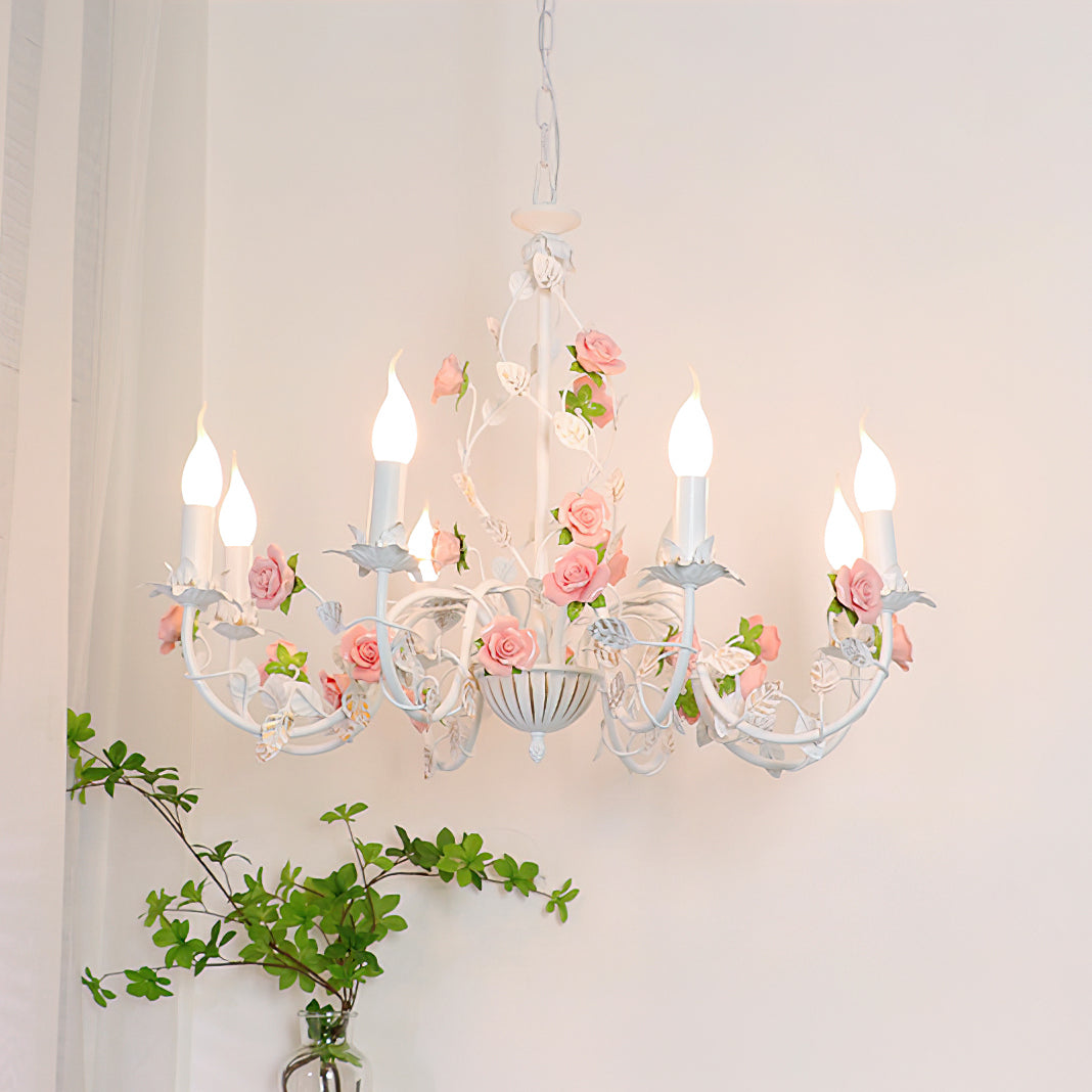 Close-up of ceramic rose petals on chandelier arm | Casa Norex