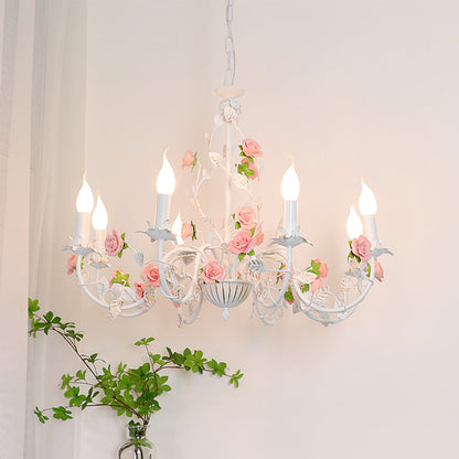 Close-up of ceramic rose petals on chandelier arm | Casa Norex